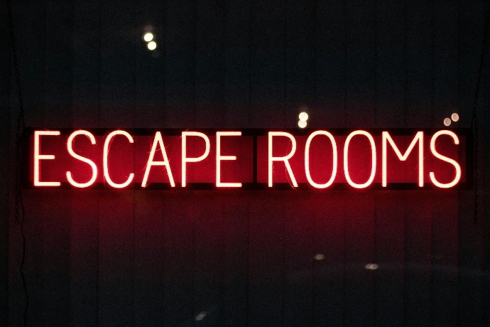 red escape rooms neon sign